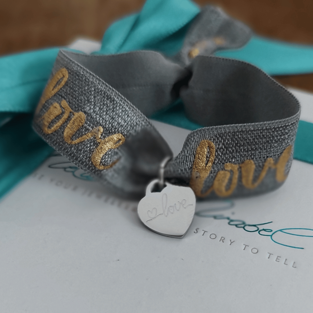 BONHEUR Herz Armband mit farbigen, elastischen Band