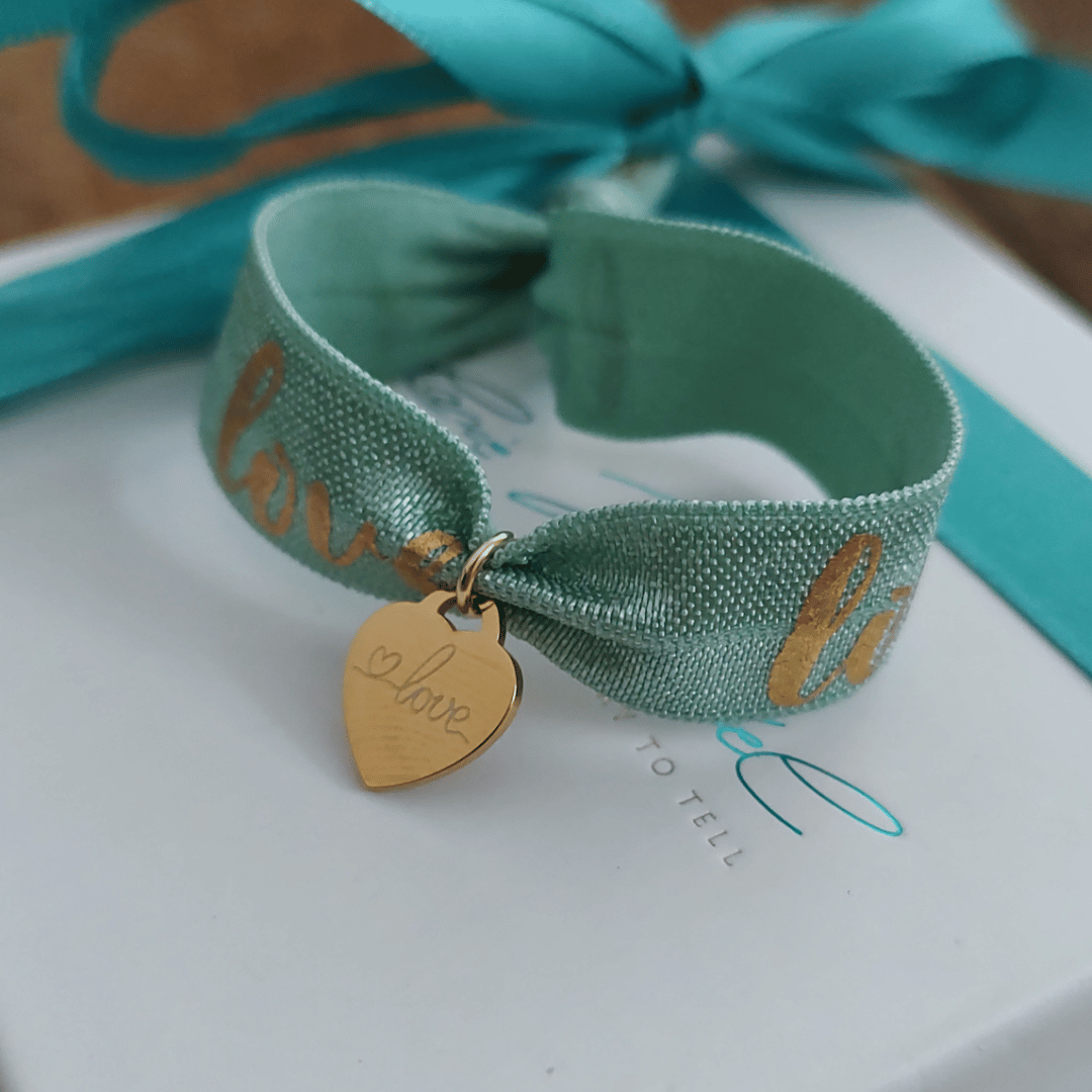 BONHEUR Herz Armband mit farbigen, elastischen Band